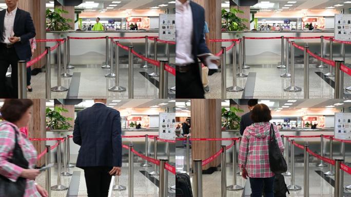 乘客在现代国际机场离港时绕过障碍物