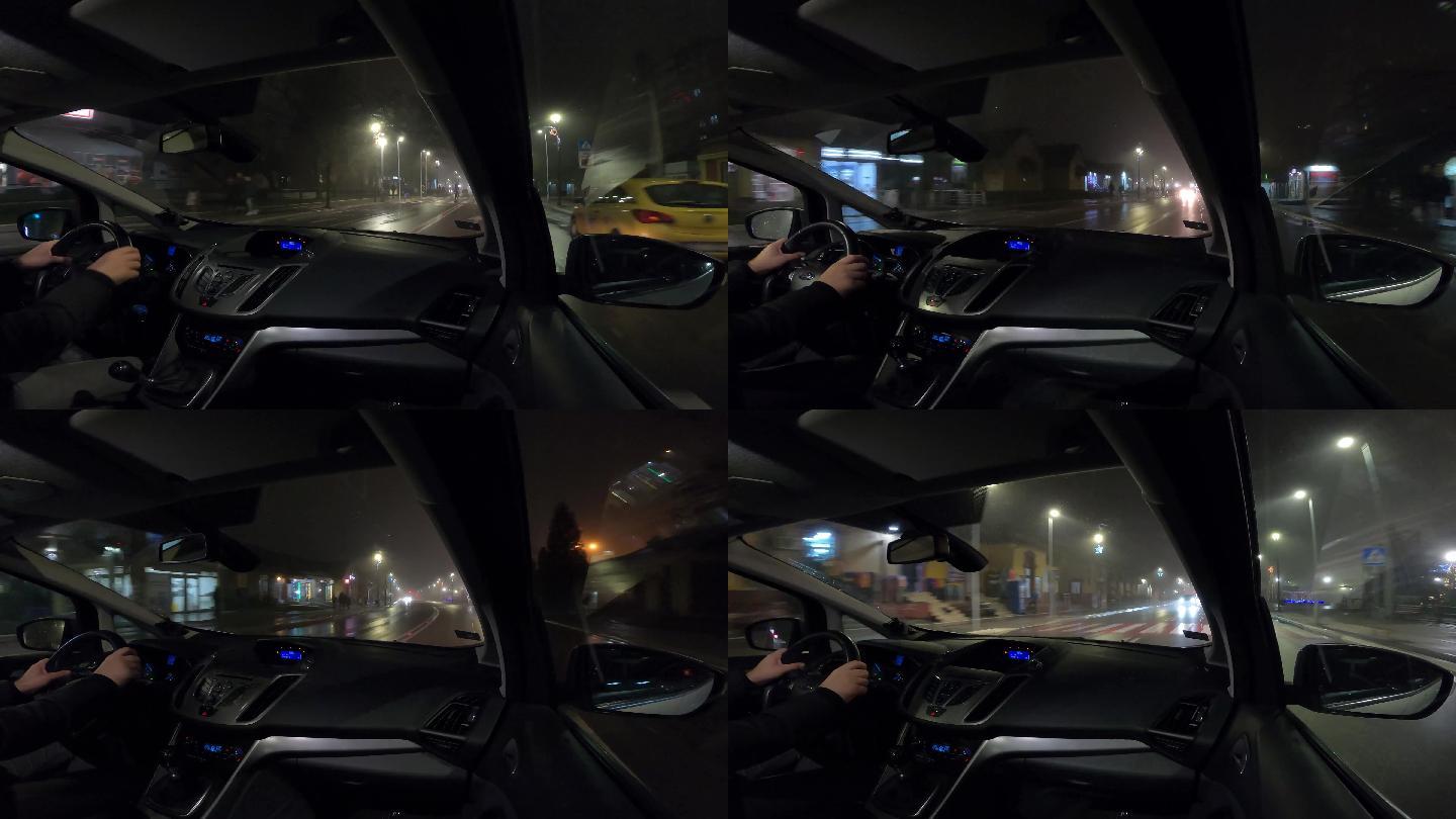 雨雾中的夜间驾车穿越城市-从乘客的角度用gopro摄像头拍摄一辆汽车在城市中行驶的4k视频片段