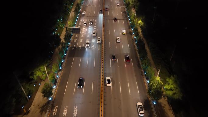 航拍-夜晚城市道路开车