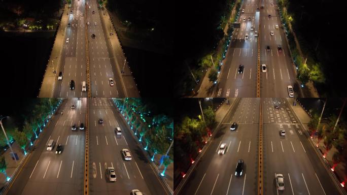 航拍-夜晚城市道路开车
