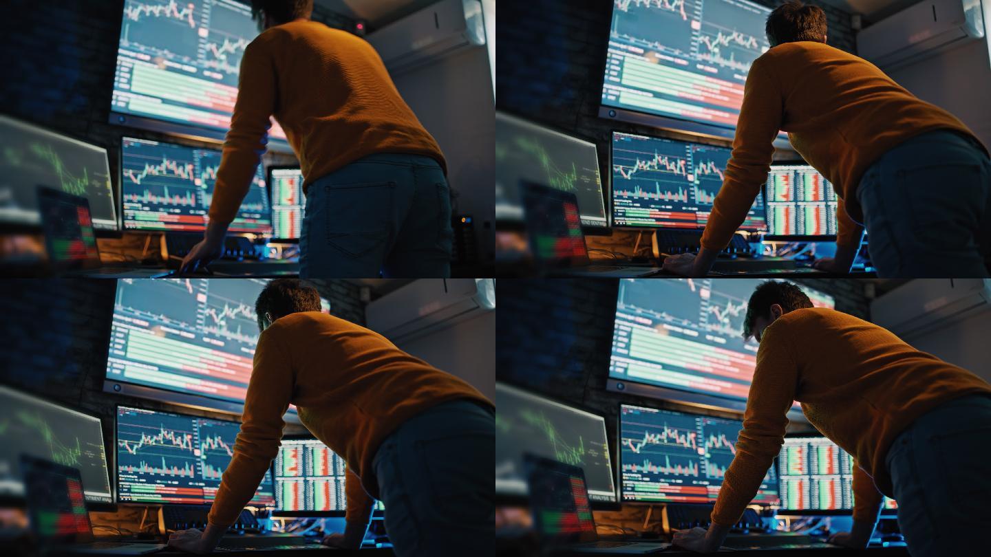 DS Man走近办公桌，在多个显示器上查看股市数据