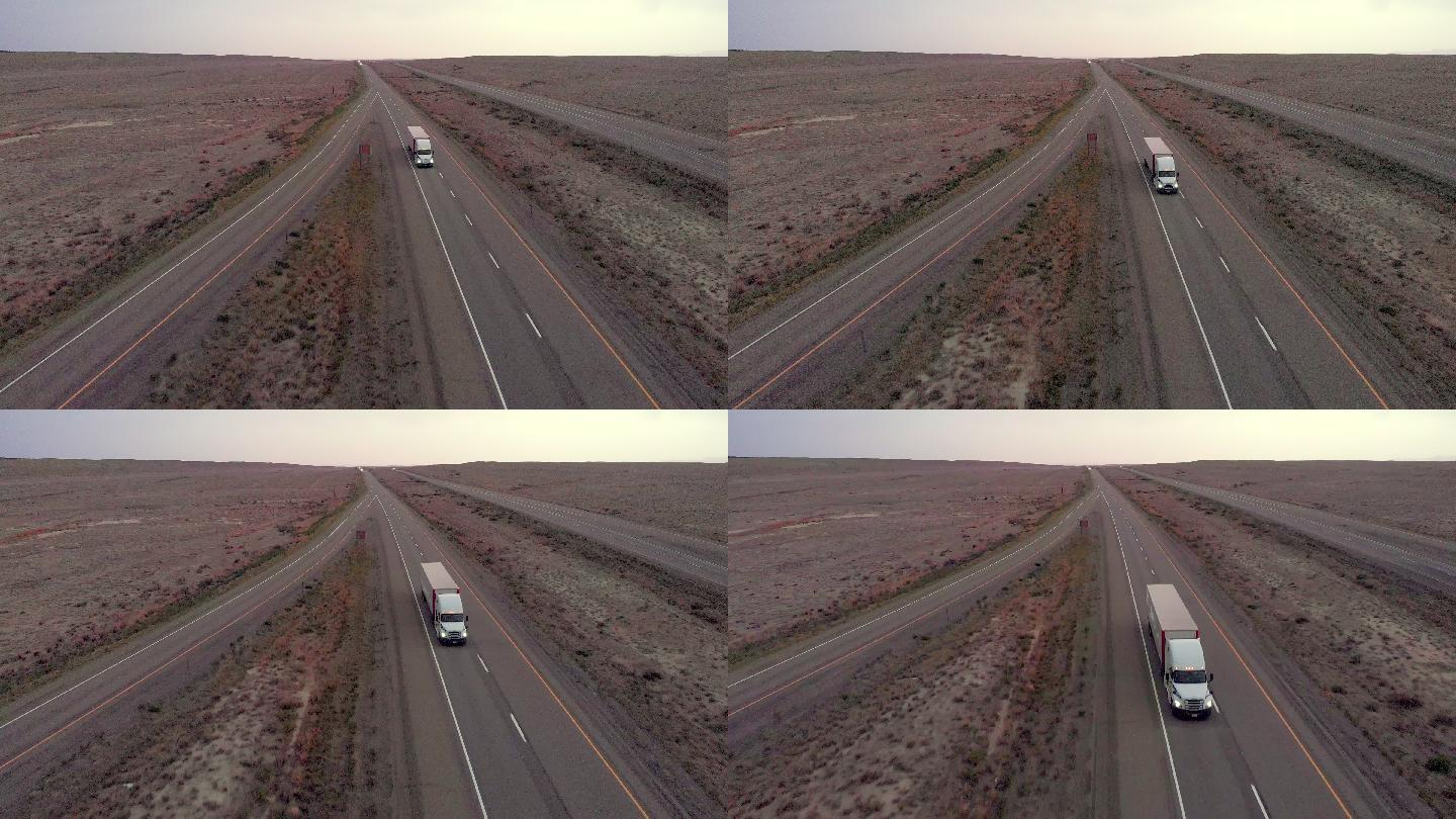 I-70上，半卡车在美国西部犹他沙漠的公路上行驶