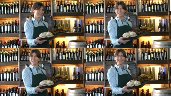 酒吧里的拉丁美洲女服务员端着盘子，面带微笑