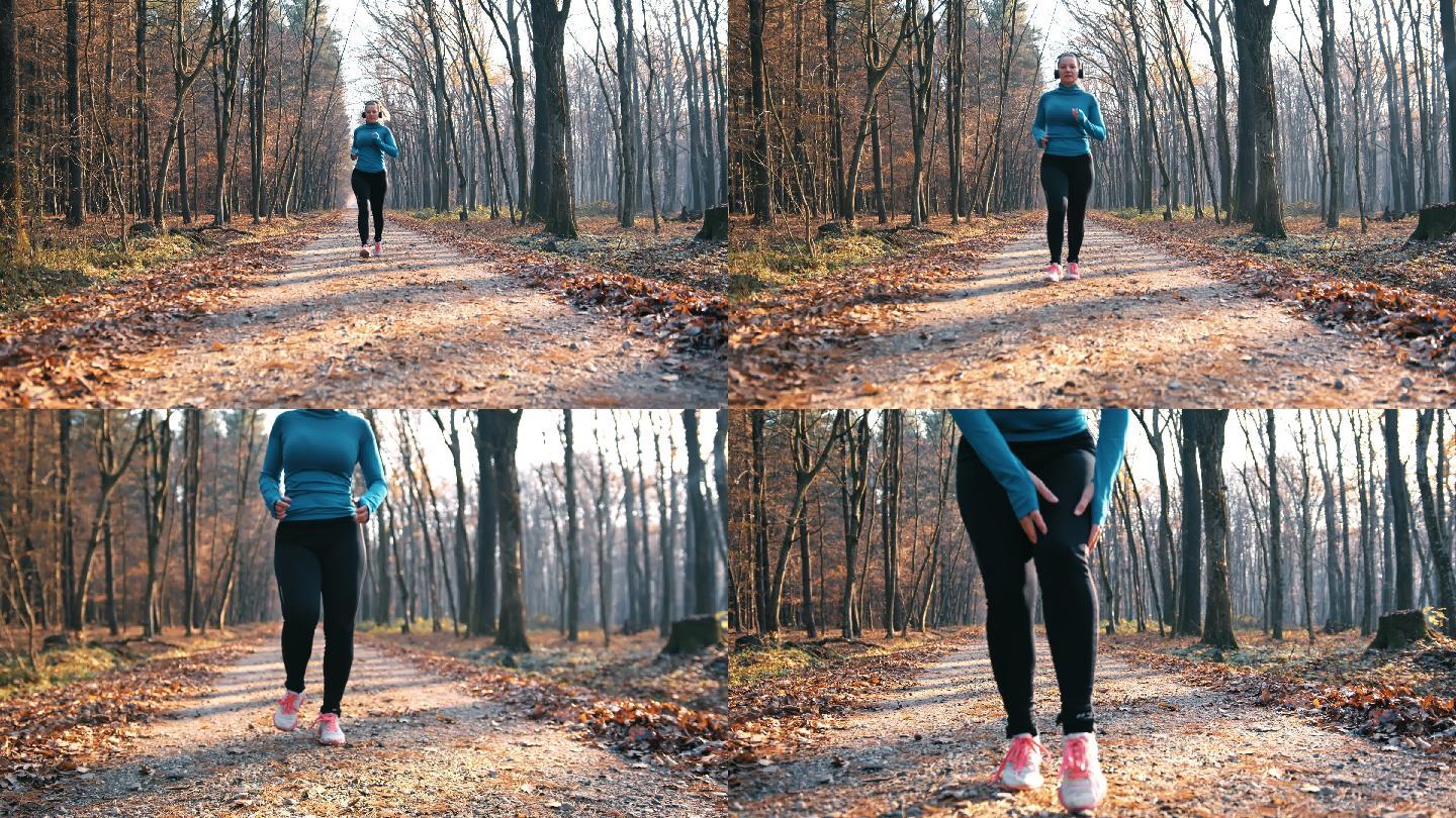 斯洛莫女子在穿越秋林的路上慢跑时，因脚踝疼痛而停下来休息