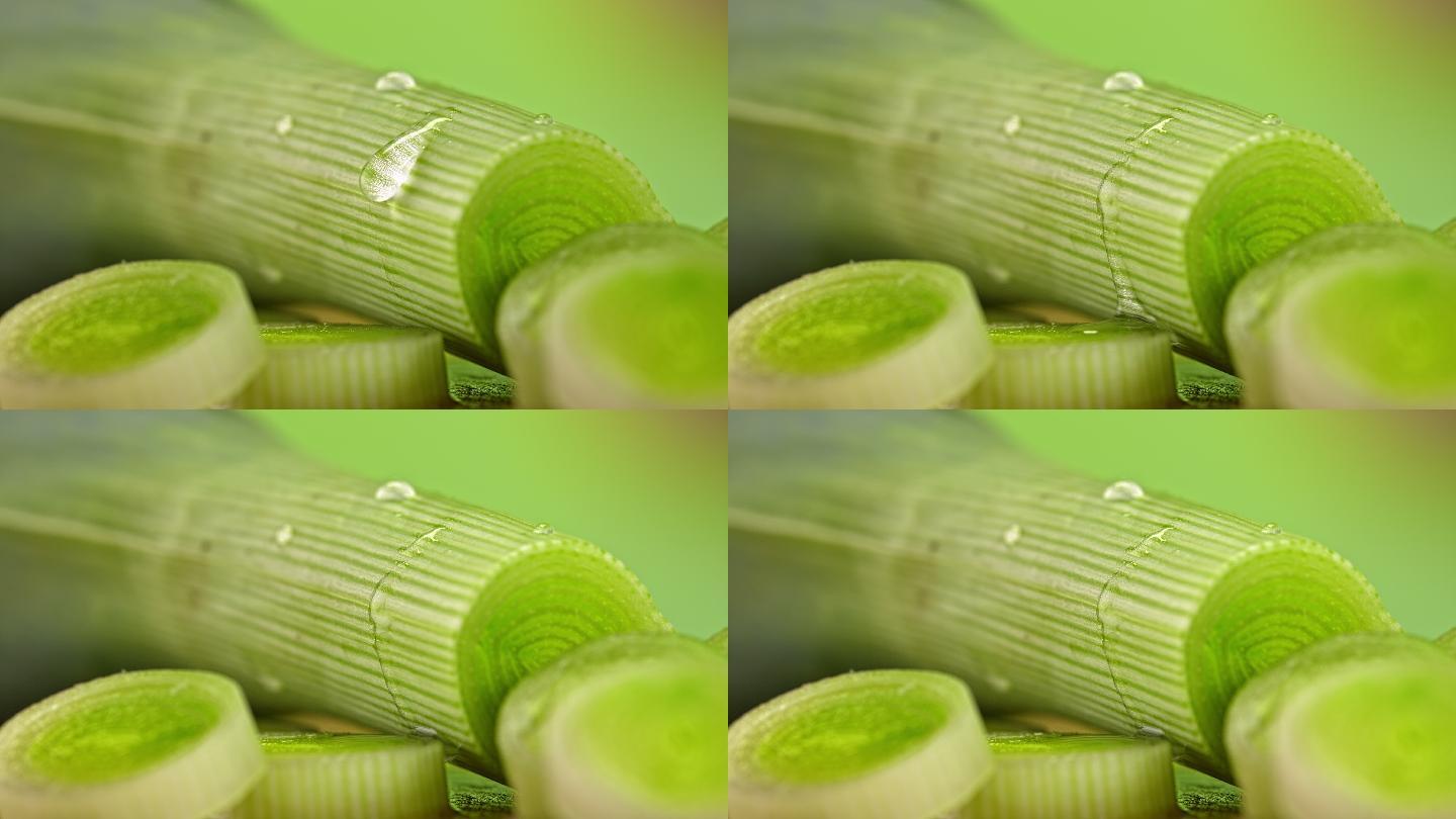 缓慢的水滴从韭菜上滑落