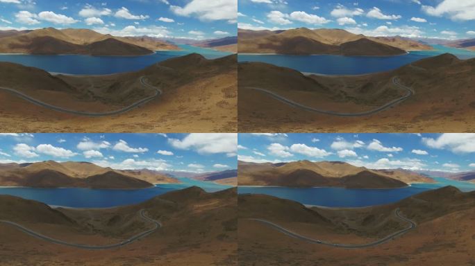 鸟瞰白云飘过西藏三大圣湖之一的羊卓雍措湖