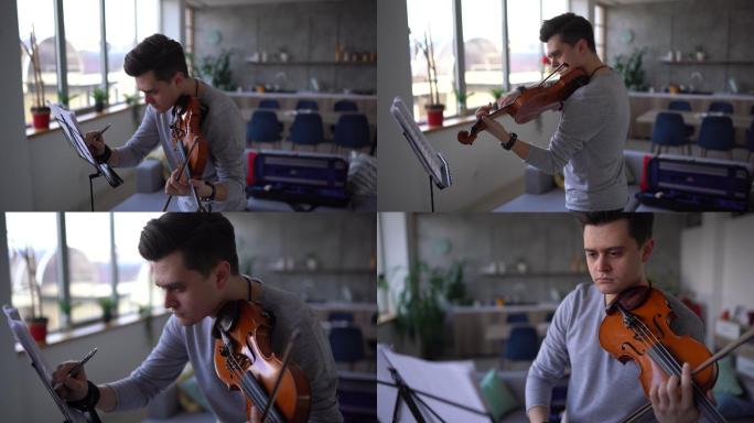 男小提琴家在客厅排练乐曲