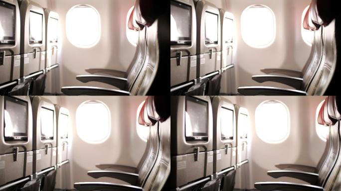 飞机内部客舱乘客，推拉镜头