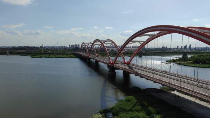 原创4K航拍天津滨海中新生态城彩虹桥风车