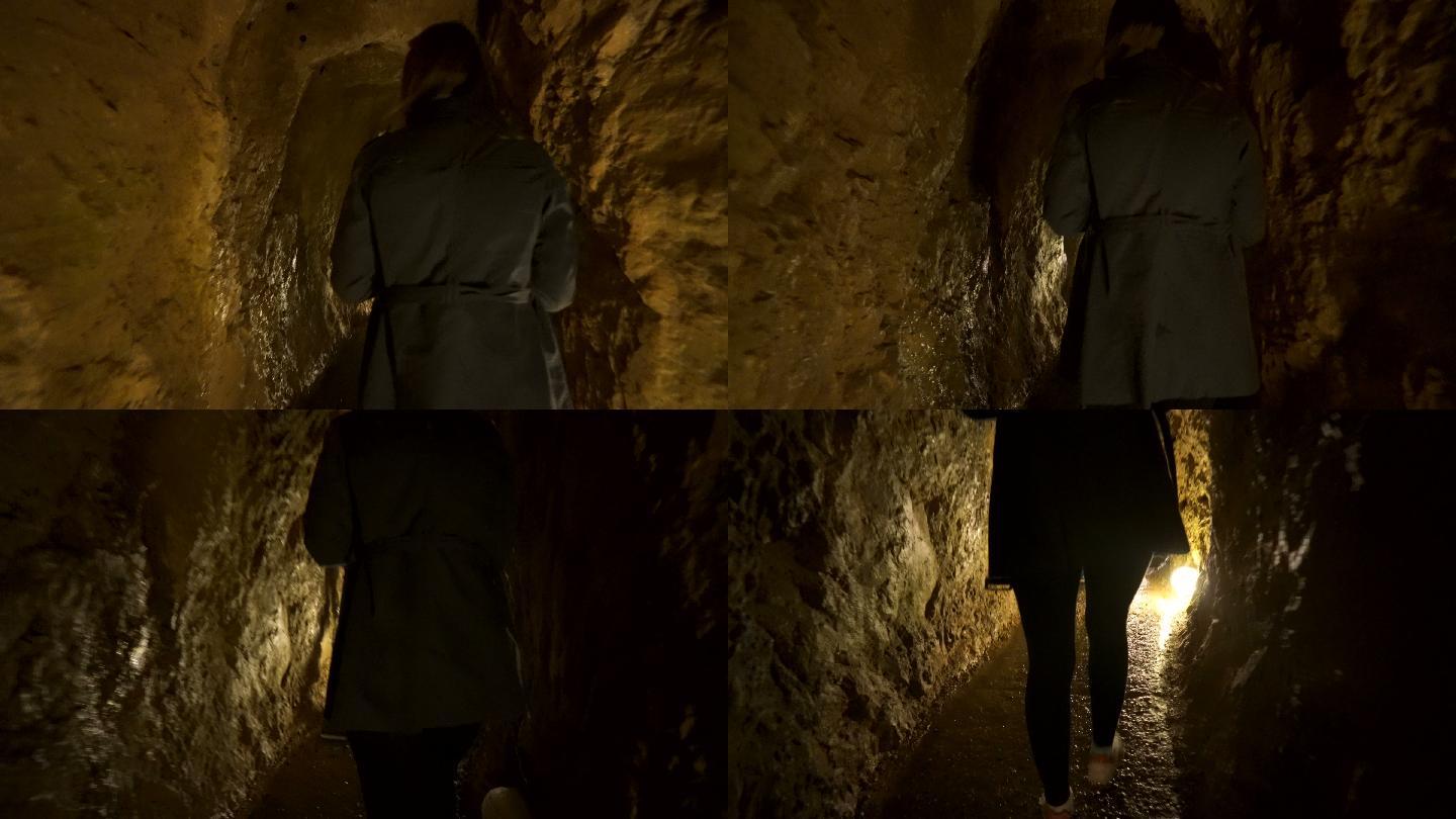 女人探索洞穴洞穴参观
