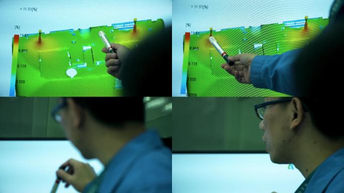 产业工人 指点屏幕 指挥自动化生产线