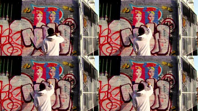 涂鸦艺术家画城市墙的广角镜头