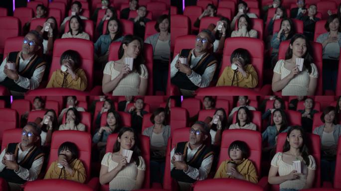 亚洲华人活跃老人和孙女喜欢在电影院看恐怖电影