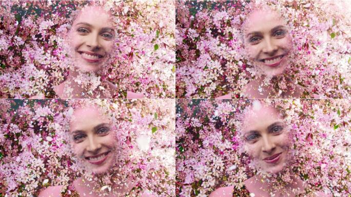 春天的清新。盛开的樱花树和微笑的女人以诱人的模特儿的形状合拢在一起。双重曝光。