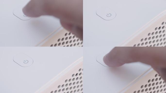 人类按下电源按钮启动电子计算机或扬声器