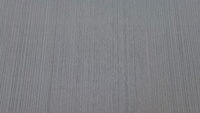 纺织厂工业整经针织整经机上的线轴筒子线