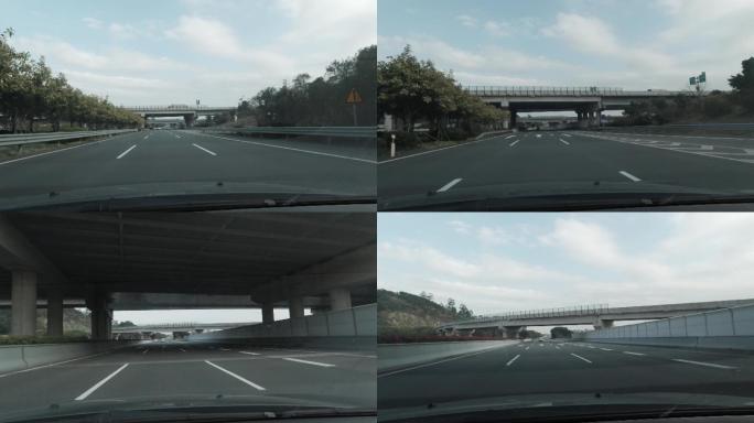 从高速公路上的汽车望出去，经过高架桥