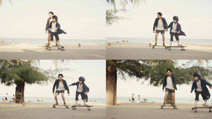 亚洲一对父子在公园练习滑板。