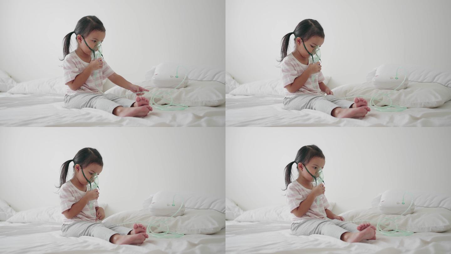 生病的小女孩用吸入器呼吸，雾化治疗