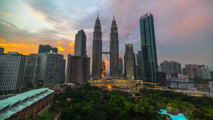马来西亚吉隆坡市电影《动云》和马石油双塔4K延时日落场景