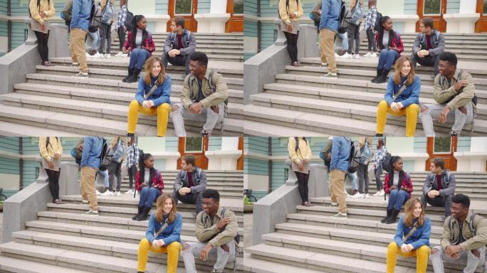 学生们在大学台阶上聊天
