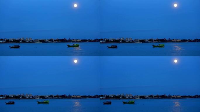 广东湛江海岸线夜晚蓝天月亮