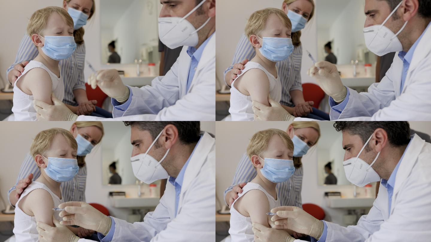 儿科医生给小男孩接种疫苗