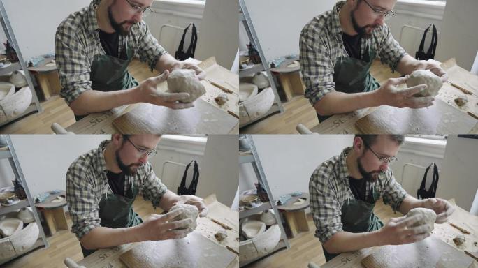 男陶艺师在工作室工作