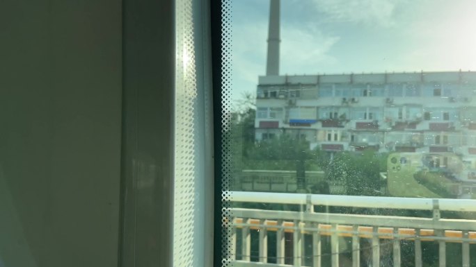 朝阳夕阳风景北京公交车窗外景色傍晚