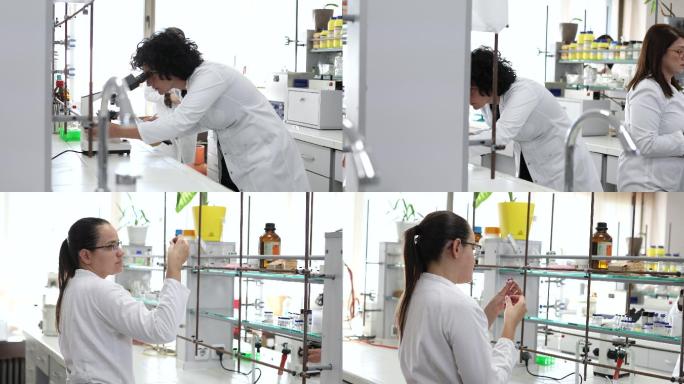 一组科学家正在一个设备现代化的科学实验室里进行实验。