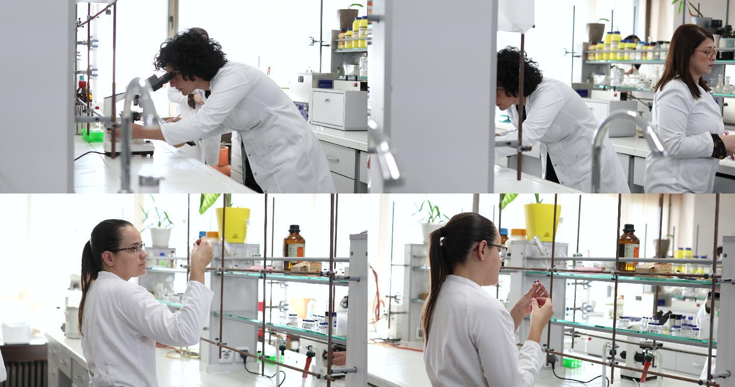 一组科学家正在一个设备现代化的科学实验室里进行实验。