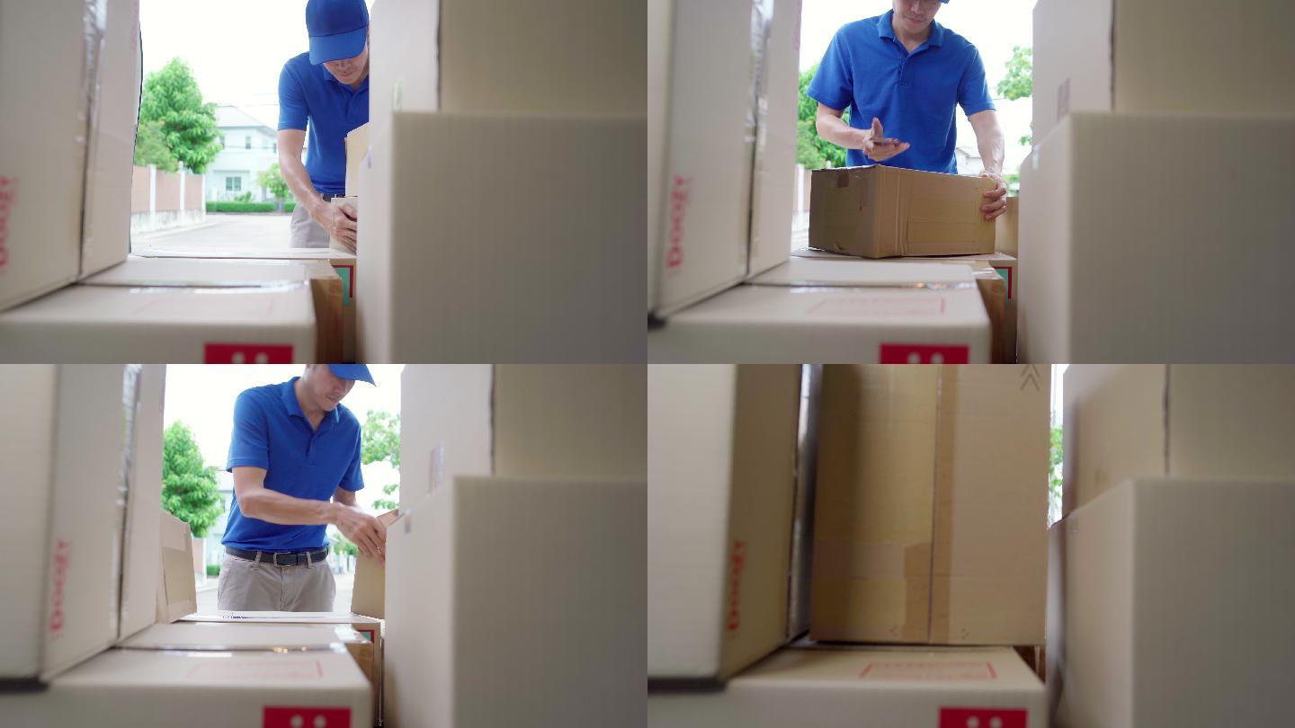 4K UHD推车：快递员从女商人手中接过包裹后，将包裹存放在货车中。车内视角。