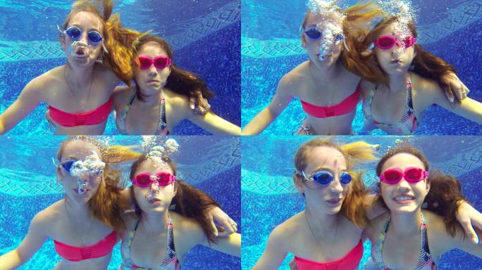少女在水下吹泡泡的特写镜头
