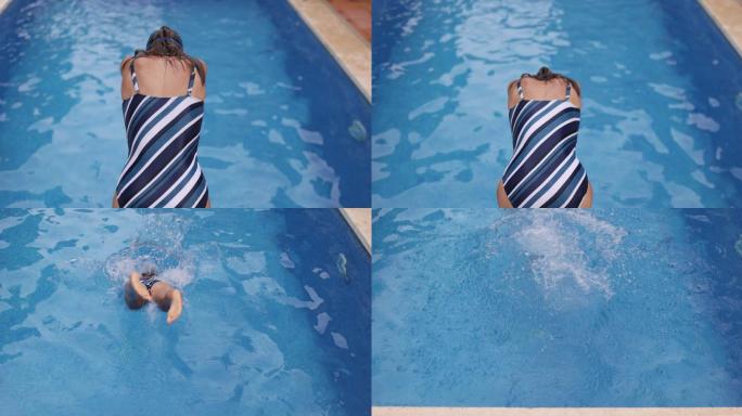 少女跳入游泳池跳水运动员