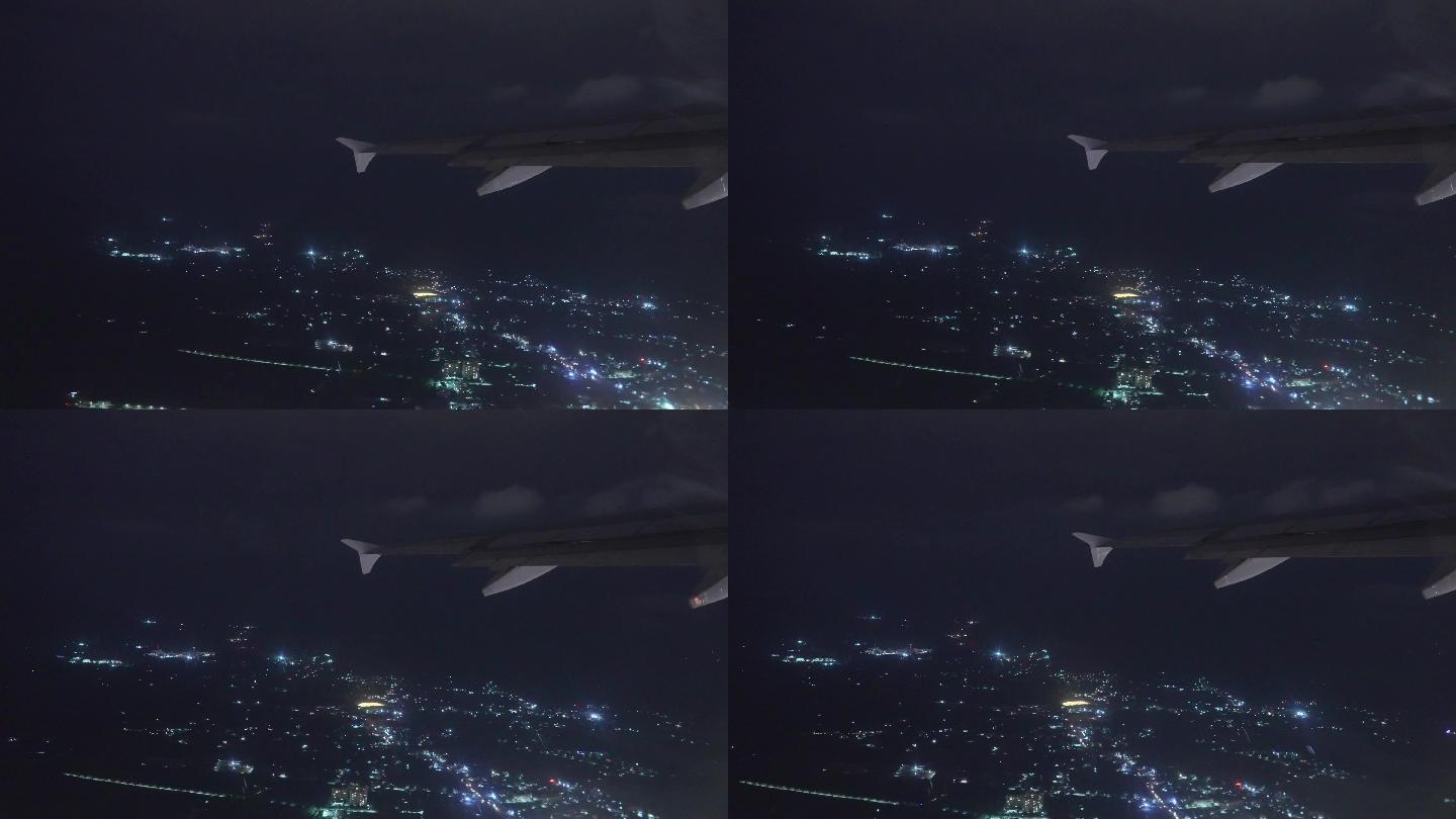 观看夜间飞行的飞机