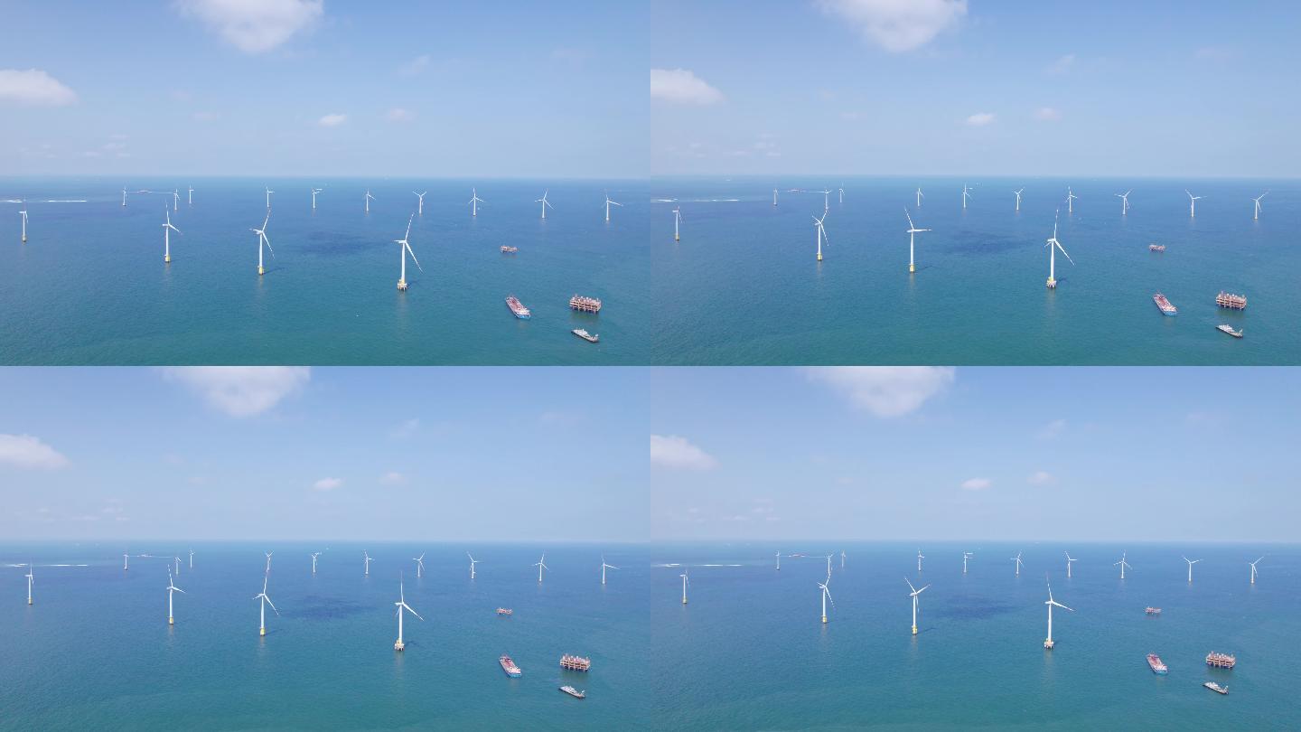 阳光明媚的日子里鸟瞰壮丽的海上风力发电厂