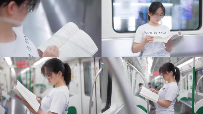地铁上看书的女孩