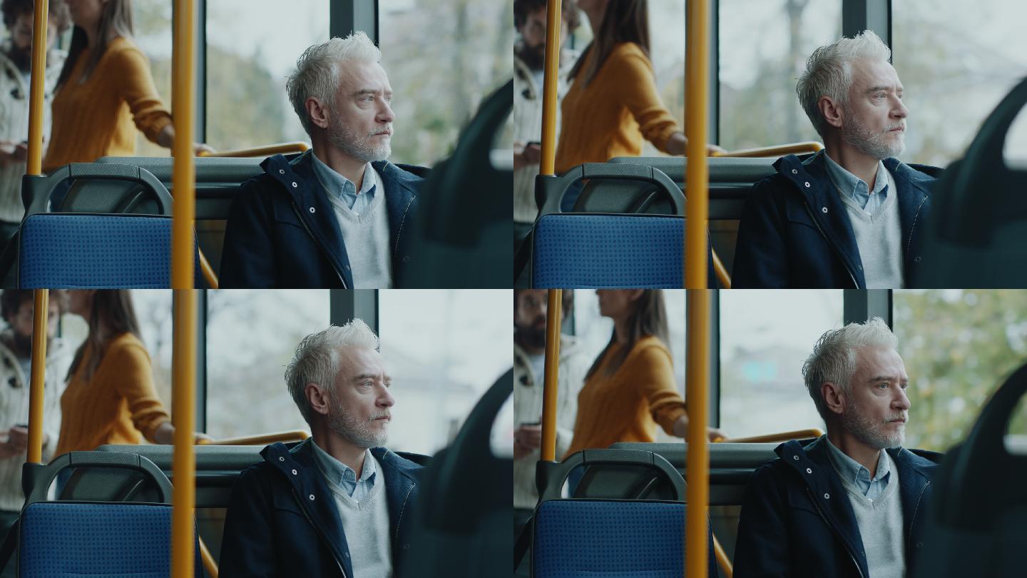 坐公共汽车的成熟男人