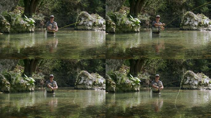 人在山河里钓鱼。湖泊湿地自然风光