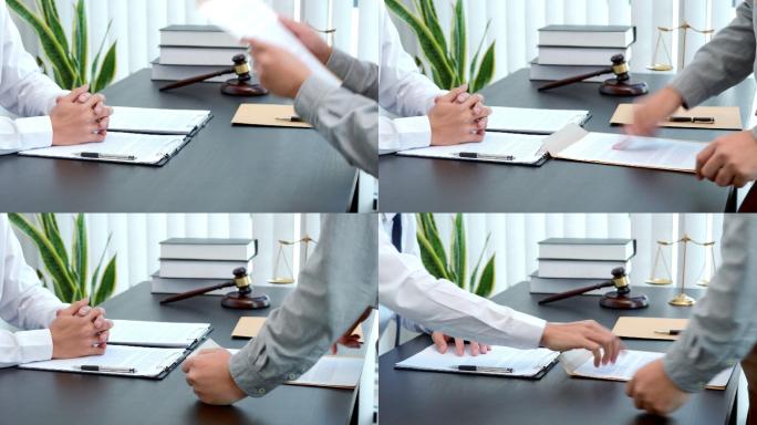 4K男性律师在办公室签订合同后咨询客户的视频片段