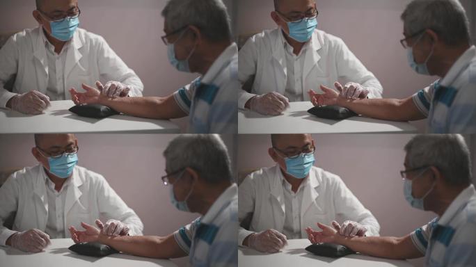 另类治疗师亚裔中国男医生握着老年患者的腕部取脉诊断