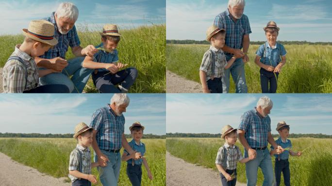 爷爷带着孙子走在田边的土路上