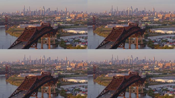 日落时分，在新泽西州普拉斯基天桥上俯瞰纽约市曼哈顿的远程鸟瞰图。带静态摄像头的无人机视频