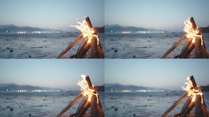 海边篝火浪漫氛围日出意境实拍
