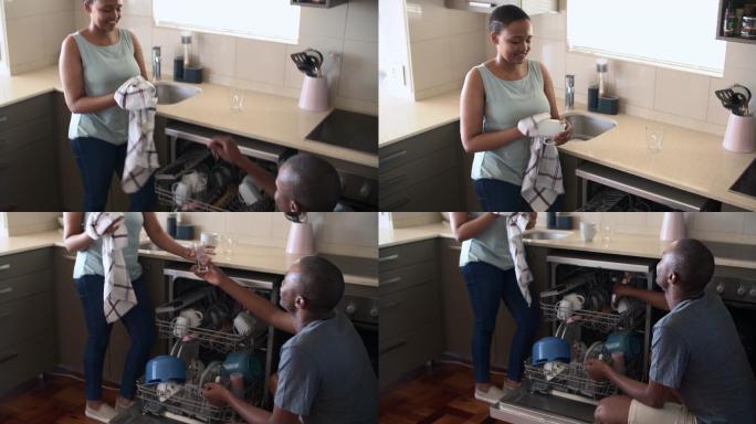 一对年轻夫妇在家打开洗碗机的4k视频片段