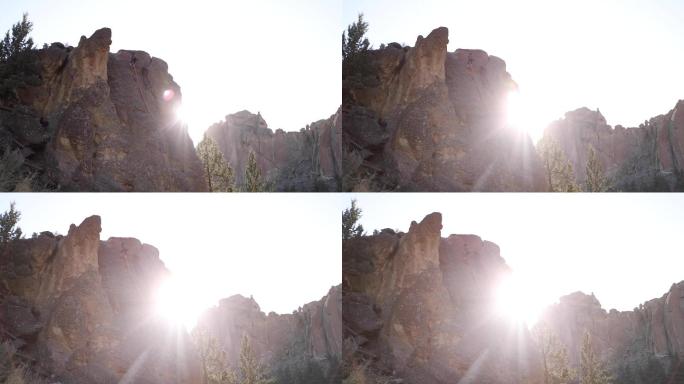 在俄勒冈州史密斯岩，攀岩者沿着悬崖面疾驰而下