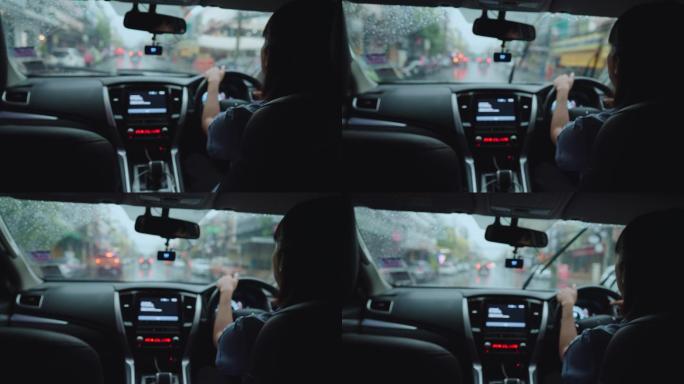 亚洲女性下班开车回家时，倾盆大雨。
