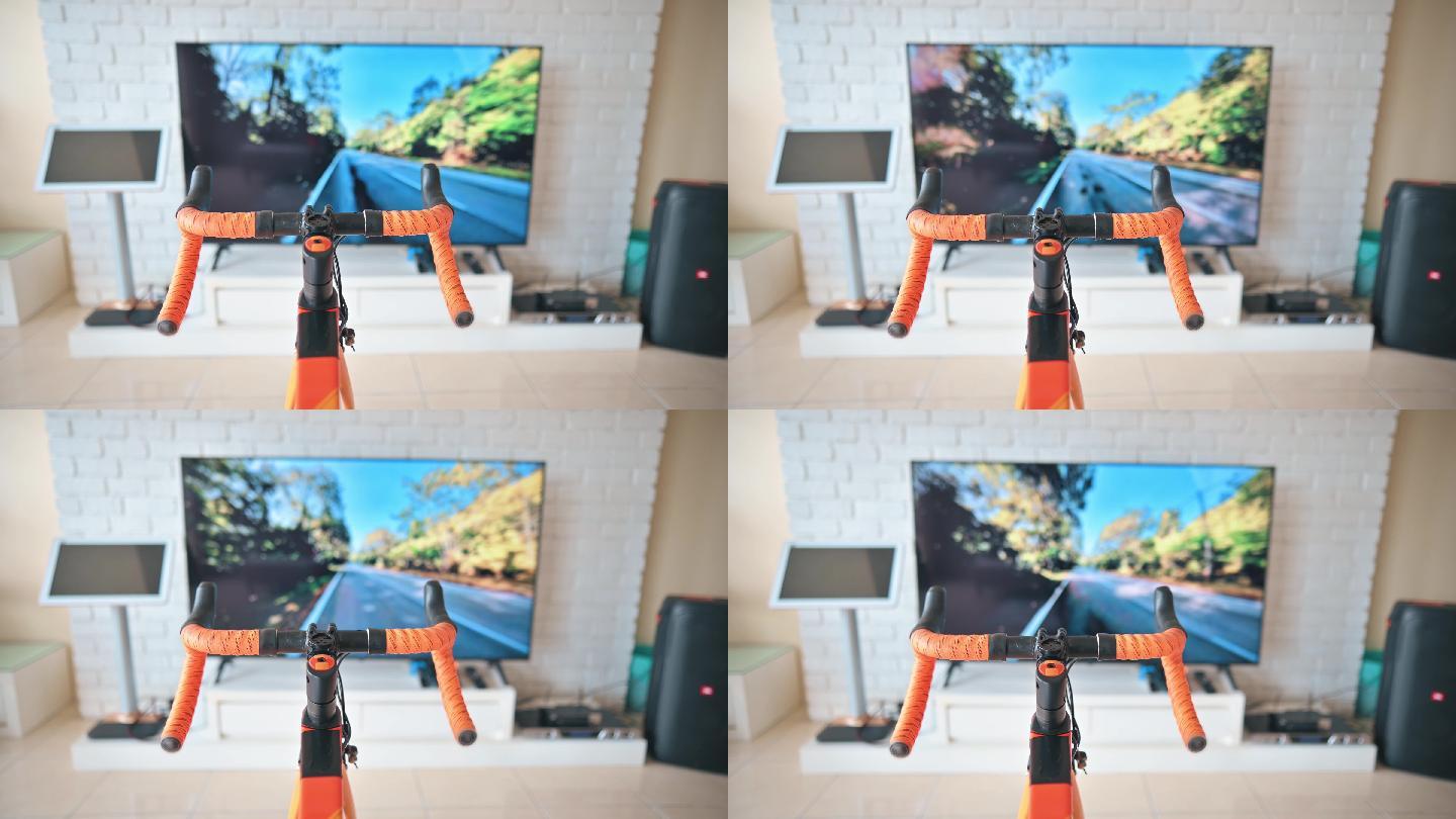 室内自行车虚拟现实活动电视屏幕前的公路自行车