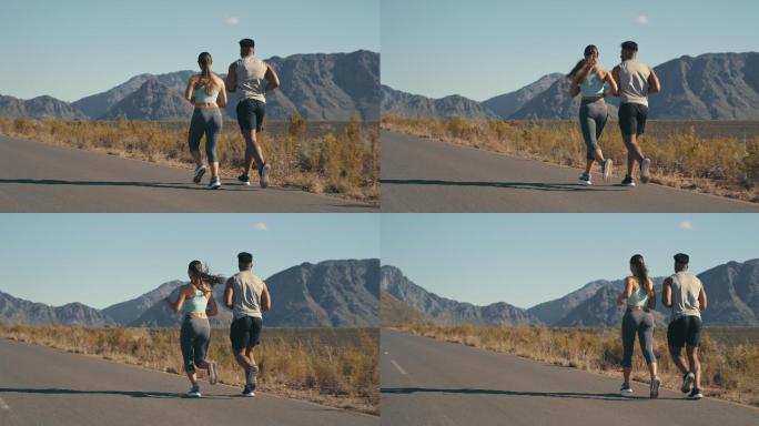 一对年轻夫妇在农村公路上奔跑的4k视频片段