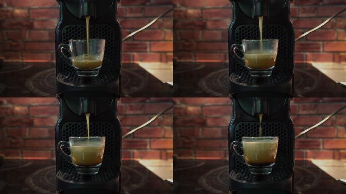 浓缩咖啡从自动咖啡机滴入杯中